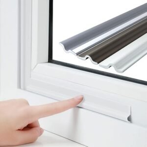 T-shaped sash window seal strip fitted on a white sash window frame